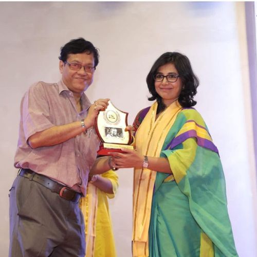 Aparajita receiving as award