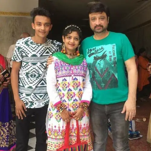 Avinash with his son and wife
