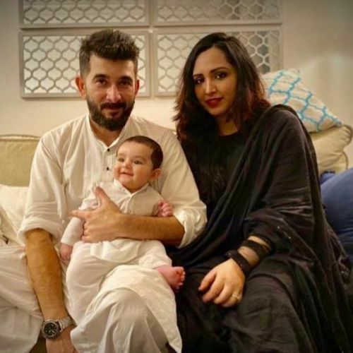 Behzaad with his wife and son