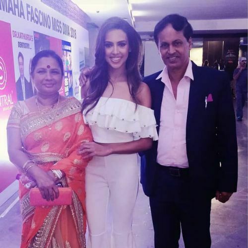 Aditi with her parents