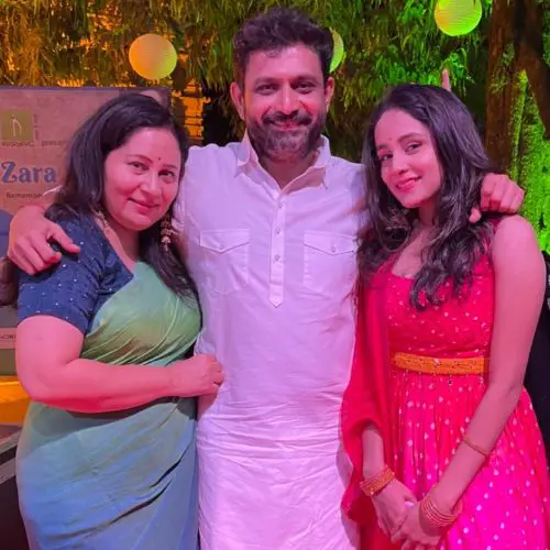 Kavya with her parents