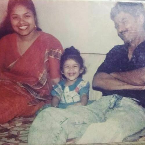 Rakshit's childhood picture with her parents