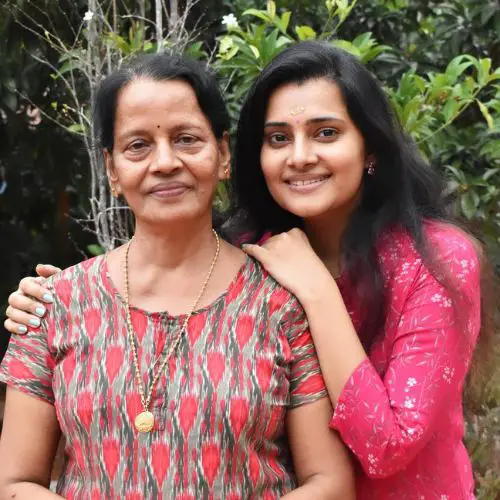 Sruthi with his mother