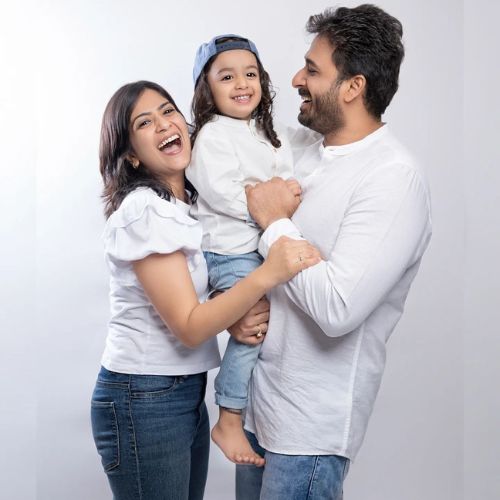Aditi Dev Sharma with her husband and daughter
