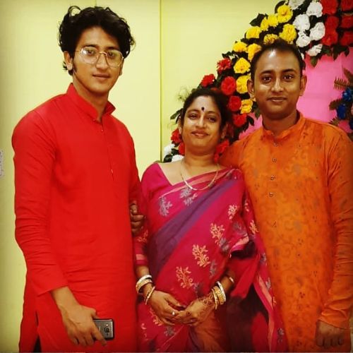 Bipul with his mother and brother