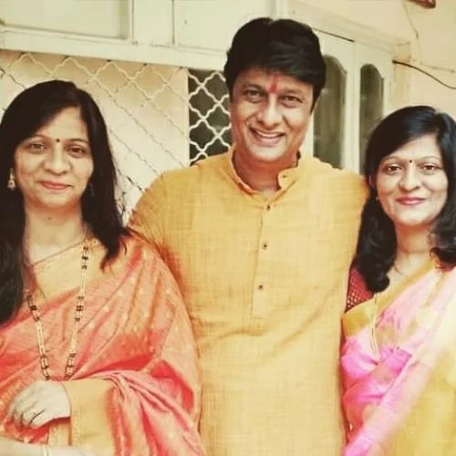 Kiran with his sisters