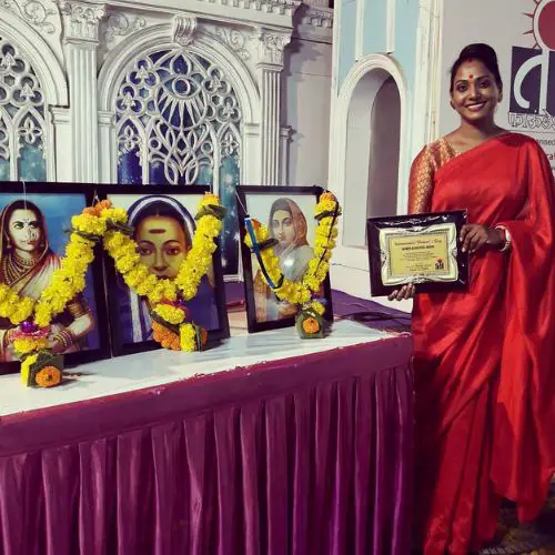 Megha with her award