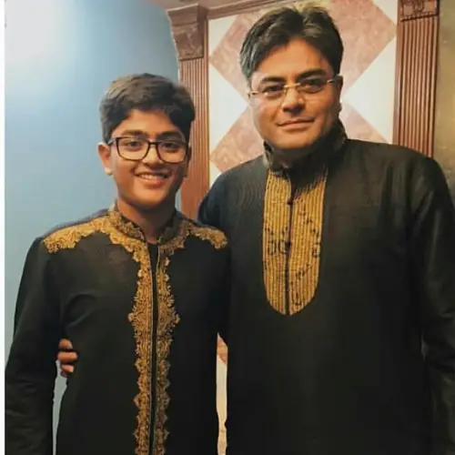 Tasneem's father and son