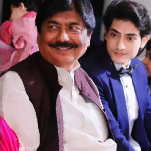 Emir Shah with his father