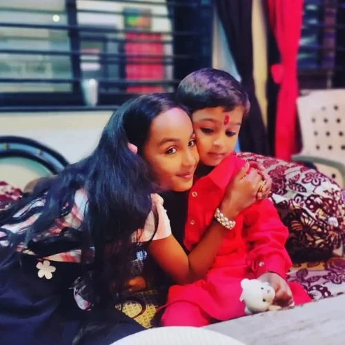 Kurangi Nagraj with her young brother